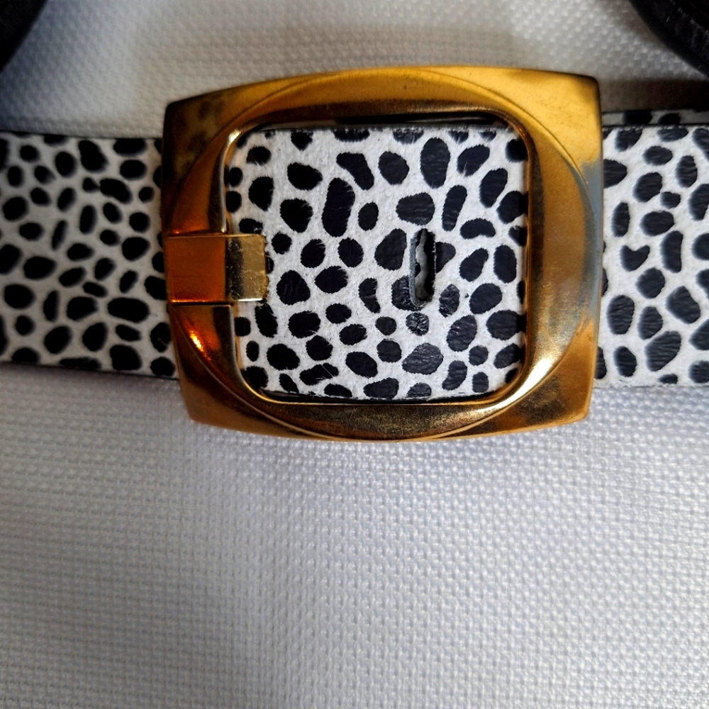 Asos brand "Wrapped Up 101 Ways" Dalmatian print plus-size belt.